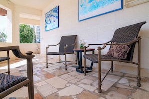 Unwind on our patio with comfy seating.
