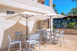 Enjoy our shared patio's comfortable seating.