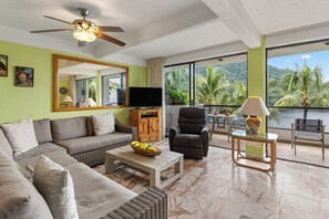 Comfortable living room with open access to the private balcony.