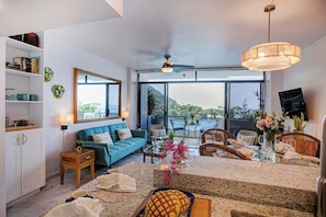 A bright and open living area with comfortable seating and decor.
