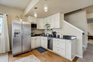 Modern kitchen with stainless steel appliances, ample counter space, and everything you need to prepare delicious meals.






