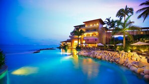 Beachfront luxury at Garza Blanca Puerto Vallarta with pool & ocean views.