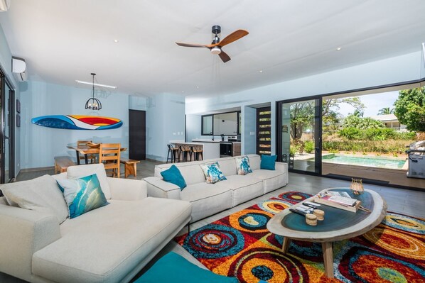 Open living area with access to the pool.