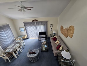 View from the master bedroom looking down onto the living and dining area.