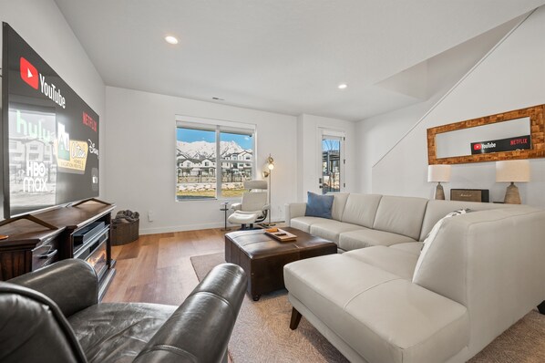 This sunlit home features scenic views of the mountains and the community pool—perfect for relaxing in every season.