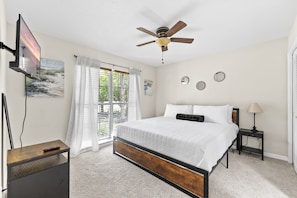 Cozy bedroom, natural light and TV