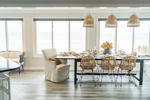 beautiful open floor plan dining area with the best ocean views, it feels like you are on the water