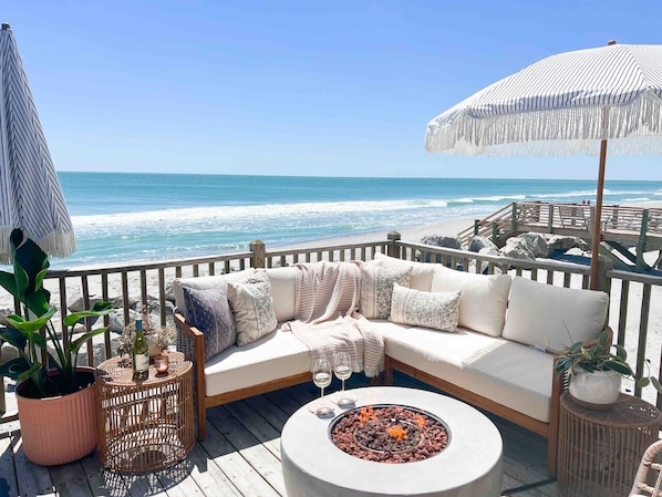 amazing deck views with sectional and firepit (not our beach bridge, you will have to use public beach access sea oats or salt marsh)