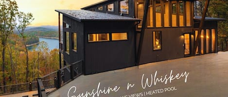 Welcome to Sunshine N' Whiskey where modern elegance meets laidback mountain vibes. Take a dip in the hot tub or heated pool while experiencing some of the best views Blue Ridge has to offer!