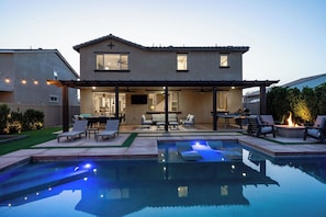 The pool's light features are perfect for enjoying a night time swim