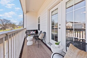 Large private balcony with outdoor seating!