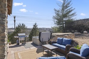 Lounge the day away on the sunny patio while you grill up a feast!