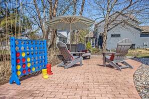 Back patio has a gas BBQ grill and plenty of seating options