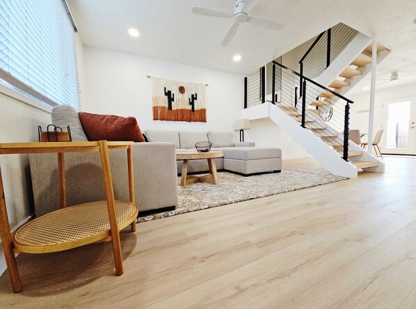 Curl up in the inviting living room & stream your favorites on the smart TV