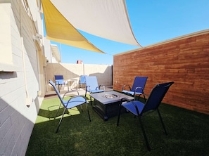 Lounge the day away in the sunshine in the private yard space