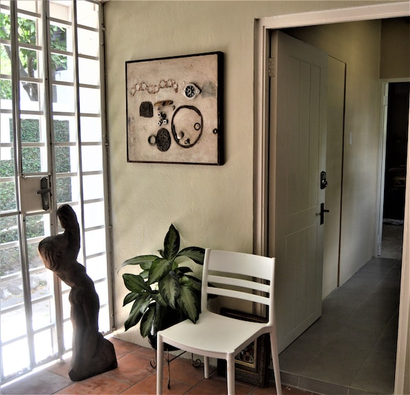 The entrance to the studio flat, it's also screened for mosquitos.