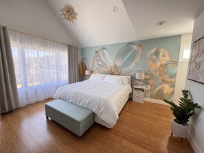 Master Suite with Ensuite bathroom. TV and mini coffee bar.