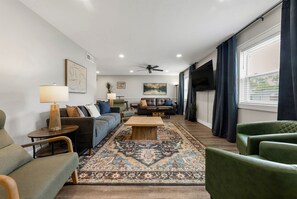 Gather ‘round! Our roomy living area has space for everyone to relax and recharge!