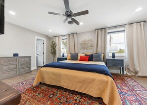 Roomy bedroom with king bed and en-suite bath for ultimate privacy and comfort