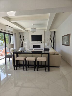 Stunning great room. Marbled butterfly walls