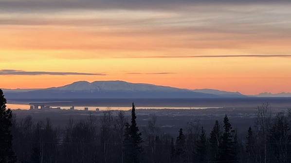 View mountains, city, and wildlife. Popular hike starts across street.