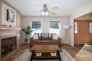 Entrance living area with fireplace