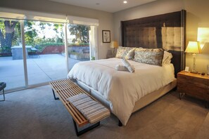 The master bedroom is a cozy retreat with a king-size bed as the focal point.