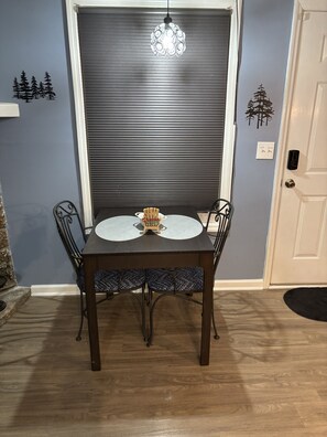Table for 2 or fold out the hidden leaf for 4! 2 more chairs are in the condo.