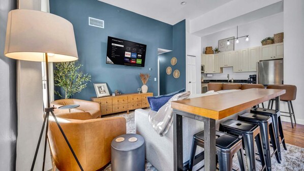 Step into a warm industrial retreat in the heart of downtown Cleveland. This Grand Arcade gem blends modern edge with mid-century charm—perfect for work or play.