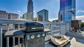 The rooftop features a modern grill, perfect for outdoor cooking and entertaining. With a stunning view and ample space, it offers a relaxing retreat where guests can enjoy meals while soaking in the fresh air and cityscape.