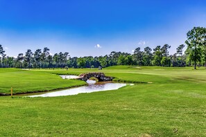 Iconic stone bridge and lush green fairways—straight out of a golf lover’s dream.