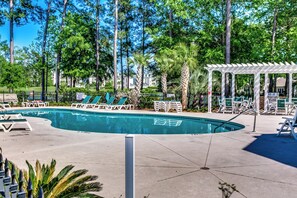 Cool off with a dip or lounge poolside—this sparkling pool is just steps away.