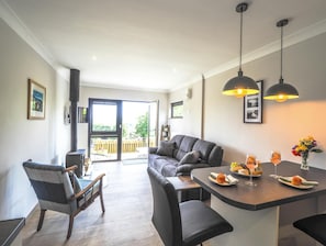 Breakfast bar and seats, with seating in the living area