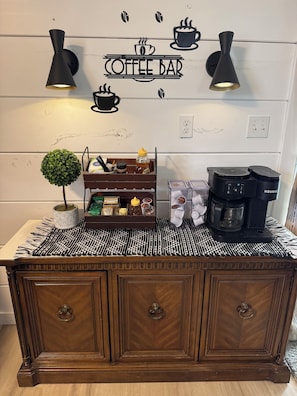 Nice coffee bar with duel Keurig coffee maker, tea, sugar, etc.
