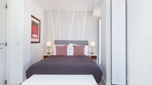 This lightly decorated bedroom provides you with a comfortable double bed. #lovely #cozy #portugal #pt #lisbon