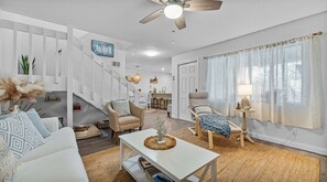 Living Room, looking into the kitchen/dining area.