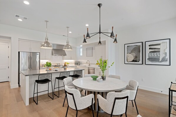 Luxurious kitchen and spacious dining area offer the perfect dining experience