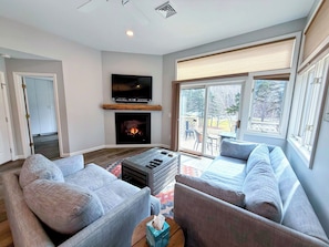 Plenty of room to relax and enjoy enjoy the views or step outside to the private back deck.