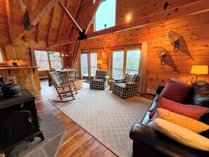 This bright open-concept living room offers plenty of natural sunlight.