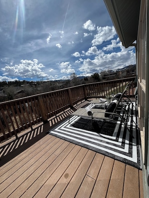 Lounge chairs on rear deck overlooking Fraser River and Continental Divide.