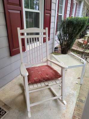 Relax on the front porch after a day of sightseeing, visiting family or work