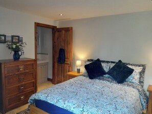 Ground floor double bedroom with en suite toilet and basin