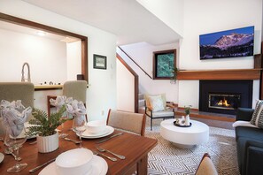 Dining table looking over to living room