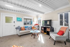 Spacious Living Room with TV
