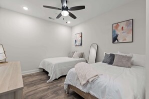 The second bedroom with two queen beds