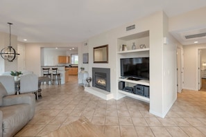 Living ara with cable TV and fireplace