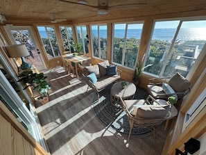 Lounge and dining area with a panoramic oceanview. Open air or climate controlled