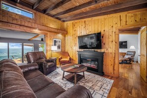 Living Room: Relax in style in this inviting mid-century living room, where vintage charm meets modern comfort. 
