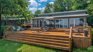 Whether you're lounging on the large deck or cozying up inside, this retreat offers the ideal blend of vintage design and modern relaxation.