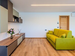 Furniture, Interior Design, Flooring, Wall, Floor, Wood, Wood Flooring, Ceiling, Room, Living Room